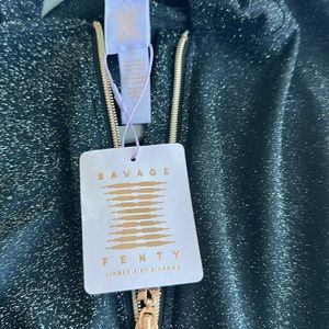 Never worn brand new onesie savage fenty black sparkly material with hood